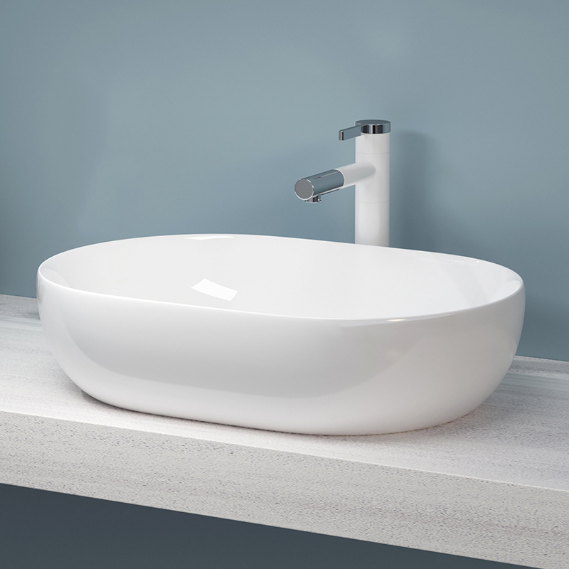modern oval ceramic art wash basin above counter bathroom sink