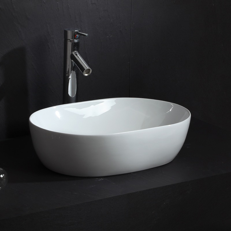 ‌Modern Artistic Triangle Ceramic Basin – Space-Saving Hotel Bathroom Sink for Luxury Interiors